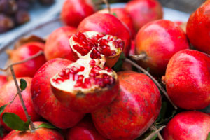 Cairo, Giza, Egypt, Muizz Street, Al-Muizz Al-Deen Allah Street, market, pomegranates Cairo, Giza, Egypt, Muizz Street, Al-Muizz Al-Deen Allah Street, market, pomegranates